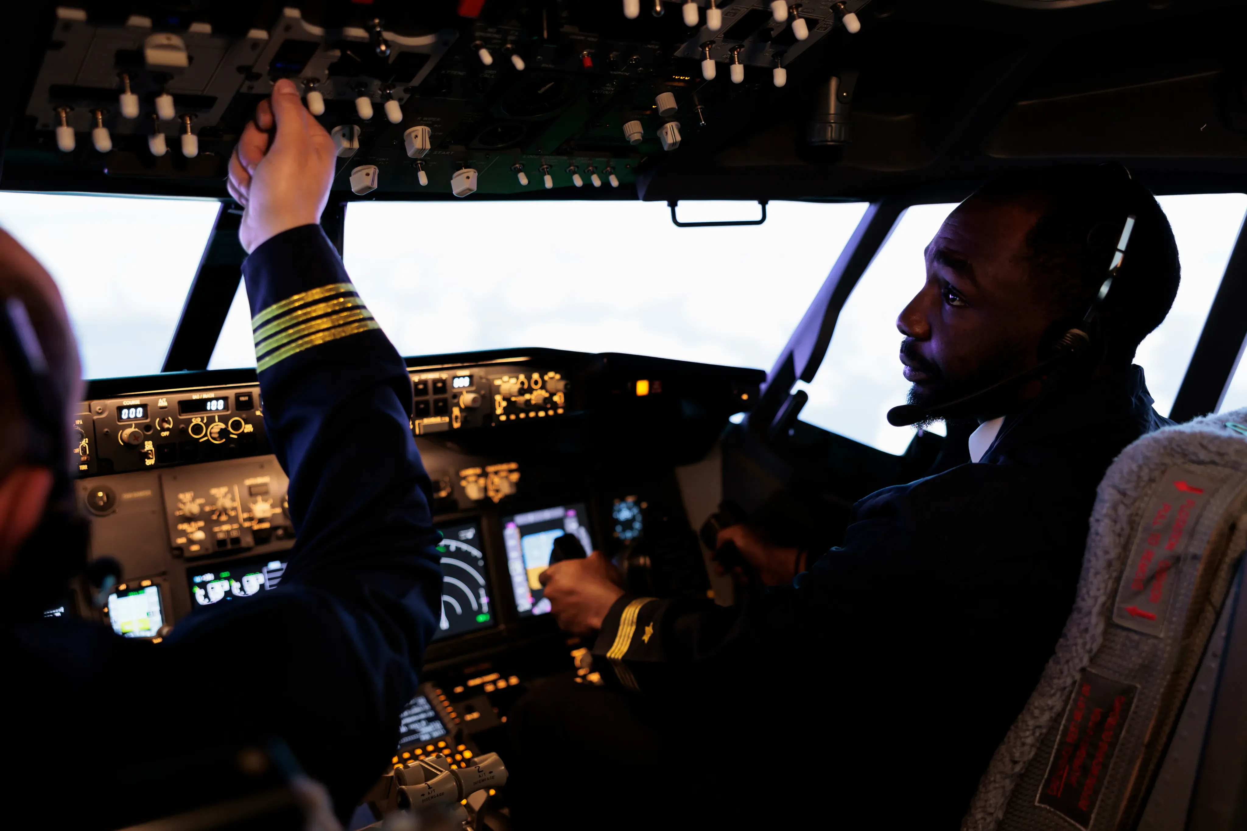 Pilots in cockpit during flight operations
